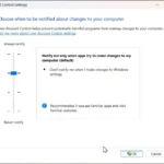 Giao diện cài đặt Kiểm soát Tài khoản Người dùng (UAC) trên Windows 11 với thanh trượt tùy chỉnh mức độ bảo mật.