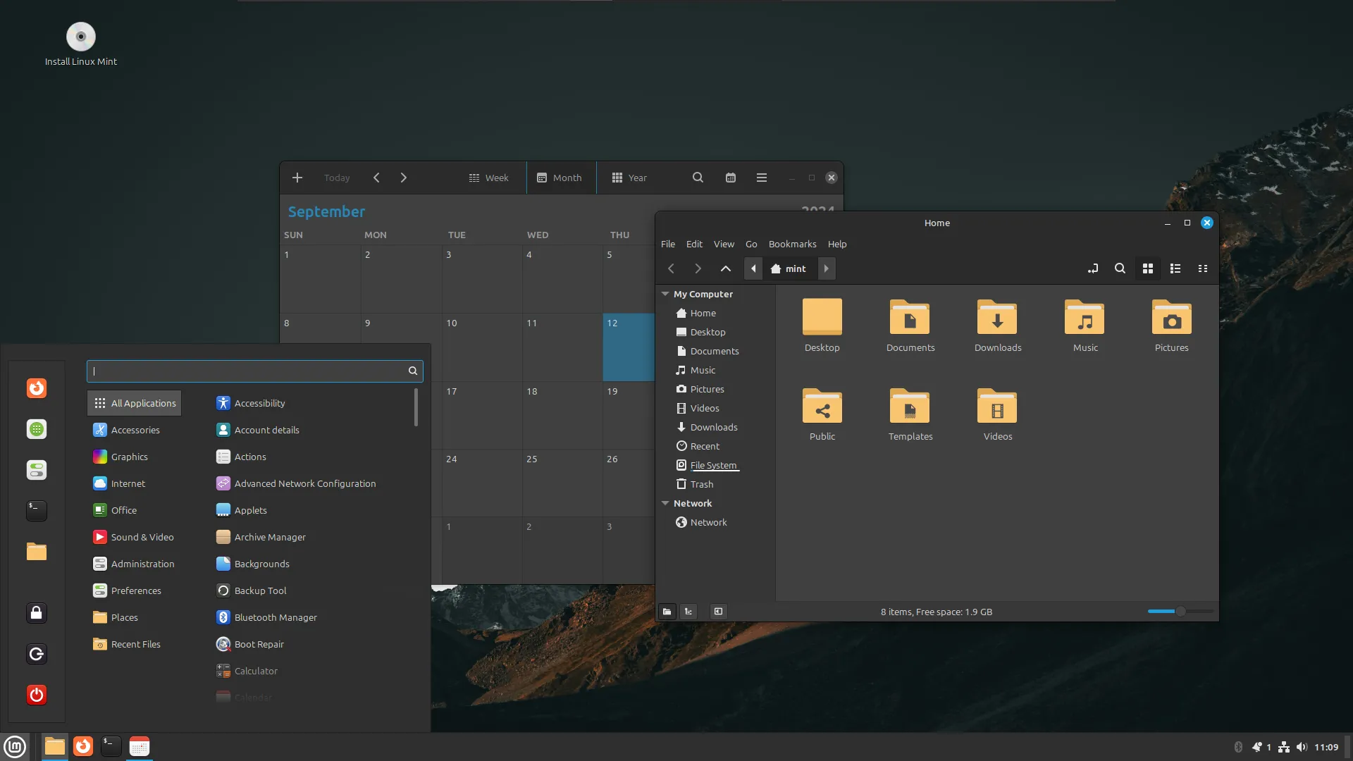 Giao diện người dùng của Linux Mint với thanh tác vụ, menu bắt đầu và các ứng dụng đang mở