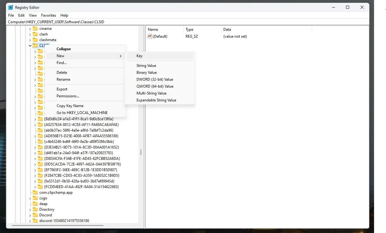 Giao diện Registry Editor khi tạo khóa mới CLSID để khôi phục menu ngữ cảnh