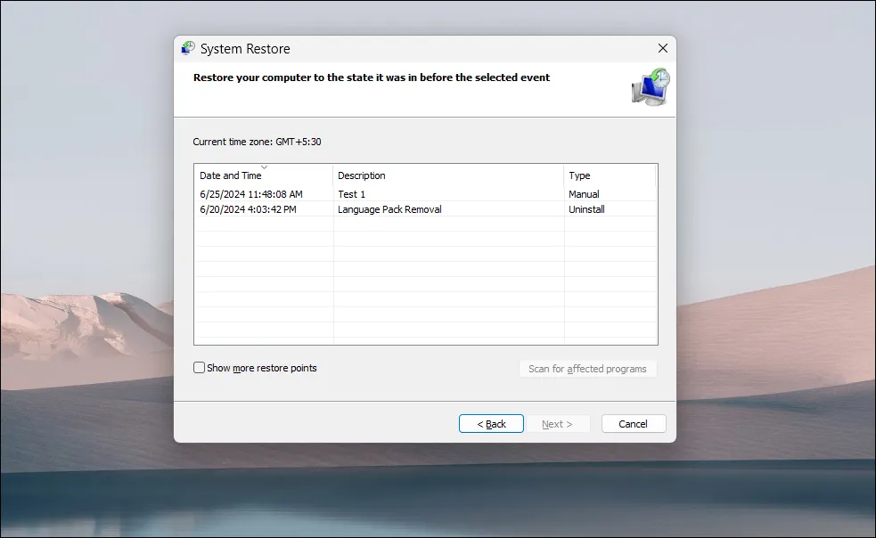 Hộp thoại System Restore hiển thị danh sách các điểm khôi phục hệ thống có sẵn trên Windows 11