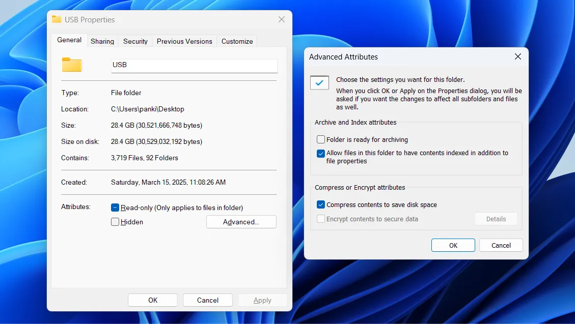Hộp thoại Thuộc tính thư mục trong Windows 11, hiển thị tùy chọn nén nội dung để giải phóng dung lượng ổ đĩa