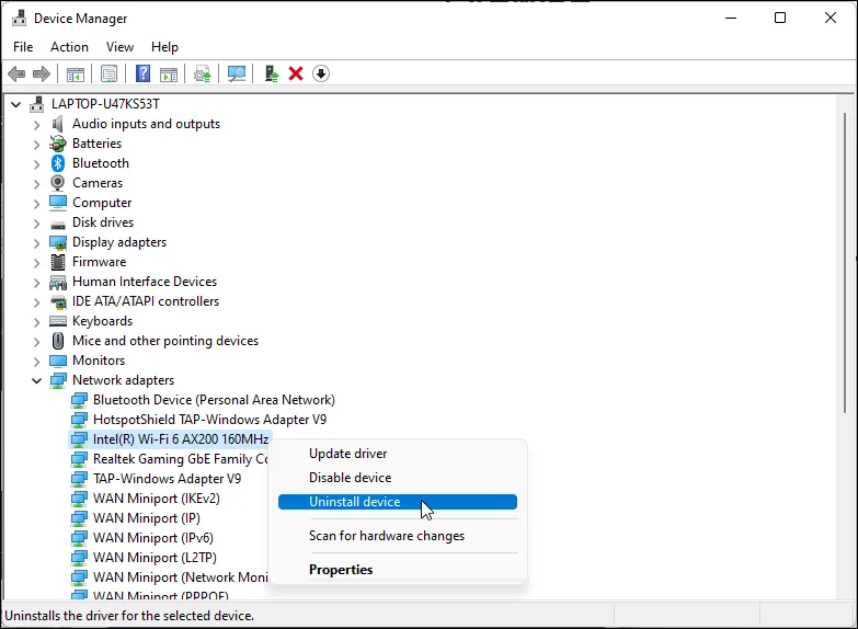 Màn hình Device Manager trên Windows 11 với tùy chọn 'Uninstall device' cho card mạng Wi-Fi.