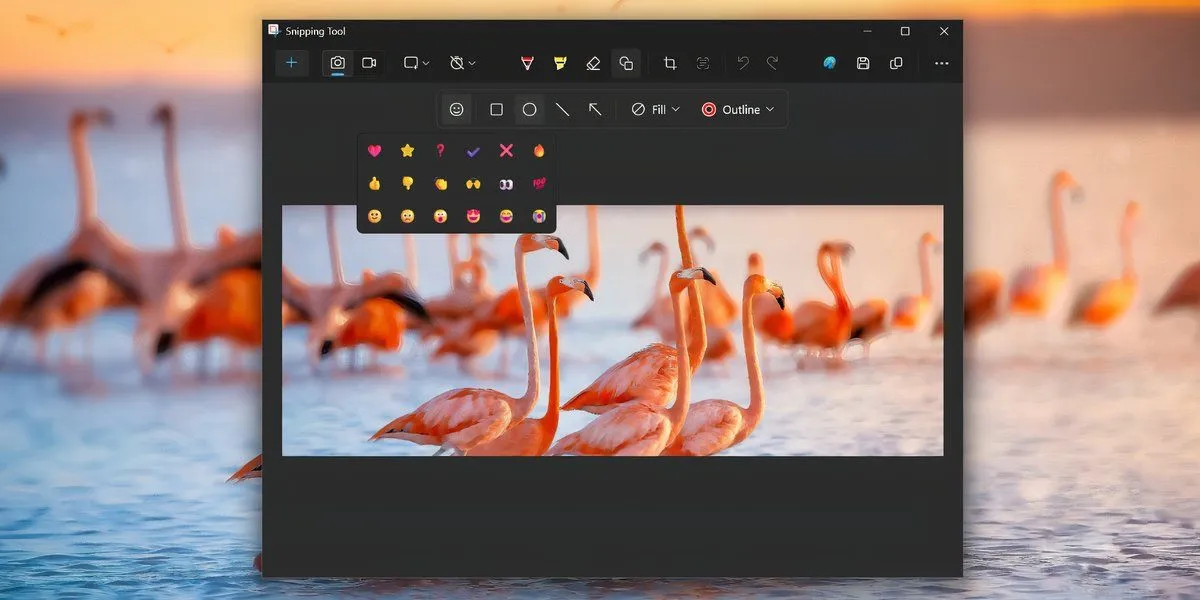 Menu lựa chọn biểu tượng cảm xúc (emoji) trong mục Shapes của Snipping Tool Windows 11 để chú thích ảnh chụp màn hình.