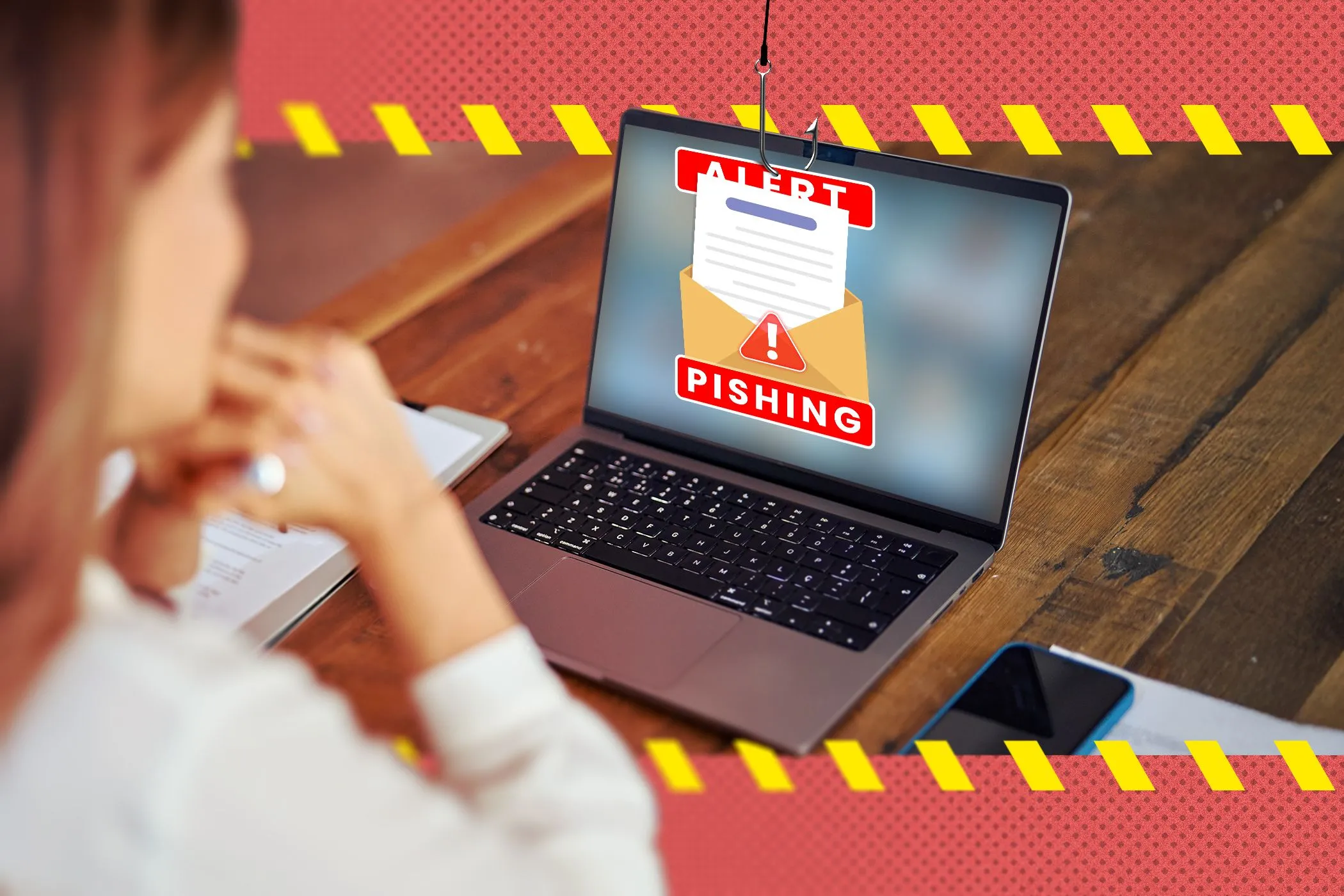 Một người phụ nữ đang sử dụng máy tính xách tay hiển thị email lừa đảo (phishing) trên màn hình, cho thấy nguy cơ tấn công mạng qua thư điện tử được AI tăng cường.
